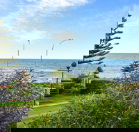 Ariadne - A Hop Skip and a Jump to the Beach with Sea Views - Tourism Cairns