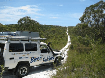 Beach trekkers North Stradbroke Island - Tourism Cairns