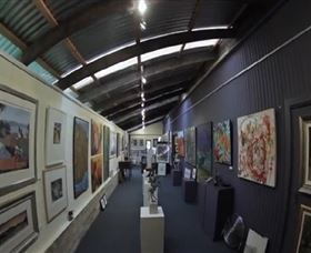 Purple Noon Gallery - Tourism Cairns 0