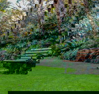 EG Waterhouse National Camellia Gardens - Tourism Cairns