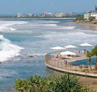 Family Romance Fun on Kings Beach - Tourism Cairns