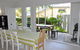 MODERN 3 BEDROOM APARTMENT IN TRADITIONAL QUEENSLANDER , PATIO, LEAFY YARD, POOL - thumb 2