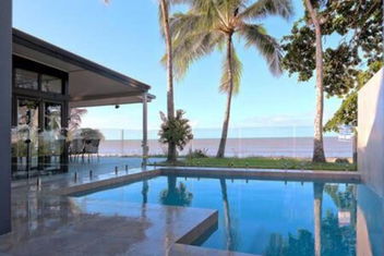 Sandcastle Retreat - Absolute Cairns Beachfront with Tourism Cairns